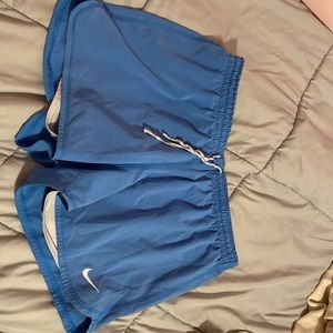 Blue Nike shorts